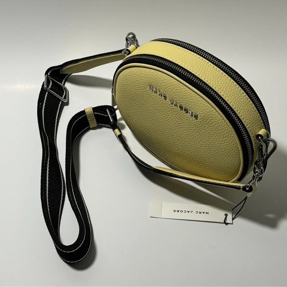 Marc Jacobs Rewind Oval Round Leather Crossbody Bag in Yellow French Vanilla.